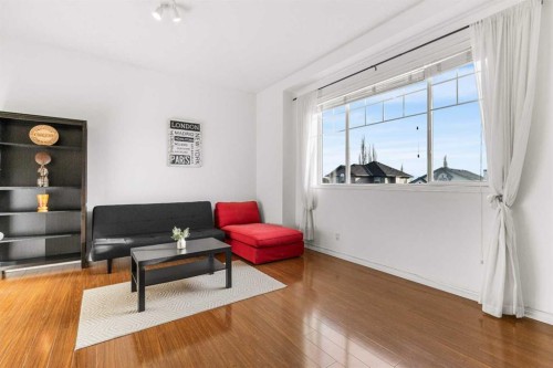 26 Arbour Butte Way Nw, Calgary, AB - Indoor Photo Showing Living Room