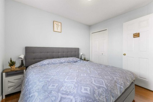 26 Arbour Butte Way Nw, Calgary, AB - Indoor Photo Showing Bedroom