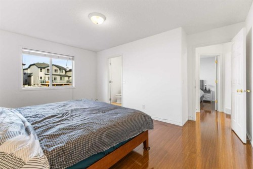 26 Arbour Butte Way Nw, Calgary, AB - Indoor Photo Showing Bedroom