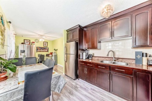 6411 26 Avenue Ne, Calgary, AB - Indoor Photo Showing Kitchen With Double Sink