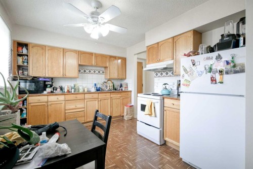 2705 38 Street Sw, Calgary, AB - Indoor Photo Showing Kitchen With Double Sink