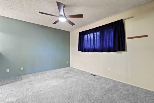 27 Sunmount Crescent Se, Calgary, AB - Indoor Photo Showing Other Room