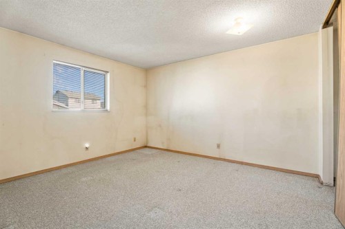 24 Martindale Boulevard Ne, Calgary, AB - Indoor Photo Showing Other Room