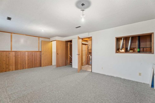 24 Martindale Boulevard Ne, Calgary, AB - Indoor Photo Showing Other Room