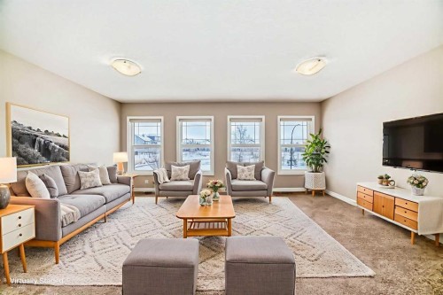 34 Cranbrook Hill Se, Calgary, AB - Indoor Photo Showing Living Room