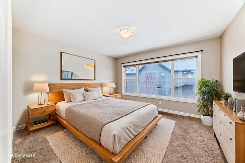 34 Cranbrook Hill Se, Calgary, AB - Indoor Photo Showing Bedroom