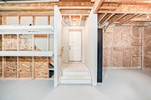 34 Cranbrook Hill Se, Calgary, AB - Indoor Photo Showing Basement