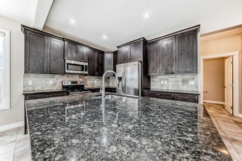 34 Cranbrook Hill Se, Calgary, AB - Indoor Photo Showing Kitchen With Double Sink
