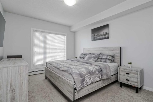 1318-604 East Lake Boulevard Ne, Airdrie, AB - Indoor Photo Showing Bedroom