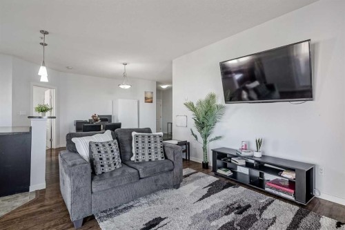 1318-604 East Lake Boulevard Ne, Airdrie, AB - Indoor Photo Showing Living Room