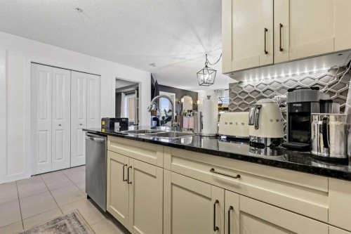 2212-81 Legacy Boulevard Se, Calgary, AB - Indoor Photo Showing Kitchen With Double Sink With Upgraded Kitchen