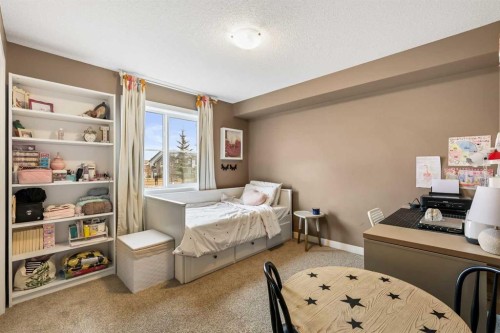 2212-81 Legacy Boulevard Se, Calgary, AB - Indoor Photo Showing Bedroom