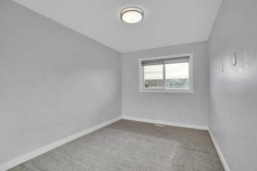 304-33 Merganser Drive West, Chestermere, AB - Indoor Photo Showing Other Room