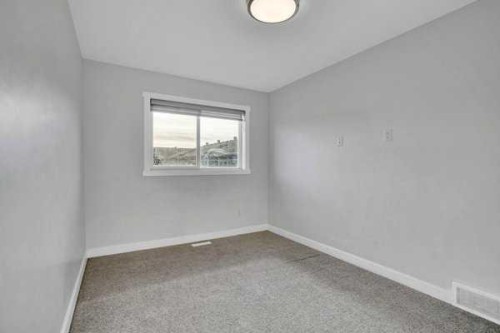 304-33 Merganser Drive West, Chestermere, AB - Indoor Photo Showing Other Room