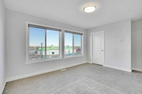 304-33 Merganser Drive West, Chestermere, AB - Indoor Photo Showing Other Room