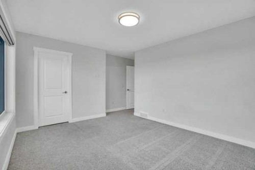 304-33 Merganser Drive West, Chestermere, AB - Indoor Photo Showing Other Room