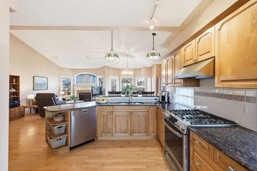 98 Mt Alberta Manor Se, Calgary, AB - Indoor Photo Showing Kitchen With Double Sink
