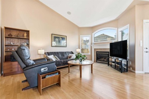 98 Mt Alberta Manor Se, Calgary, AB - Indoor Photo Showing Living Room With Fireplace