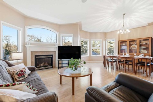 98 Mt Alberta Manor Se, Calgary, AB - Indoor Photo Showing Living Room With Fireplace