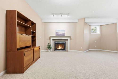 98 Mt Alberta Manor Se, Calgary, AB - Indoor With Fireplace