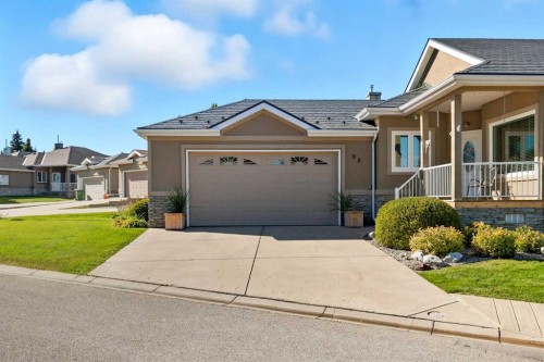98 Mt Alberta Manor Se, Calgary, AB - Outdoor With Facade