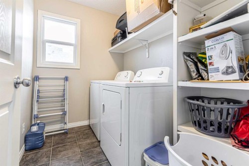 183 West Creek Landing, Chestermere, AB - Indoor Photo Showing Laundry Room