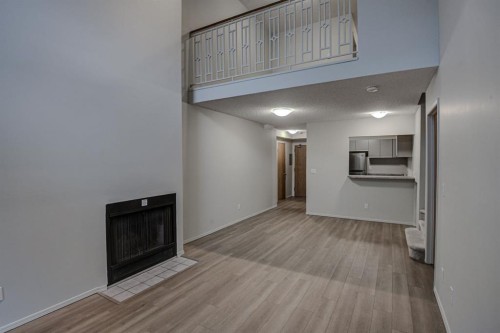 104-1720 13 Street Sw, Calgary, AB - Indoor With Fireplace
