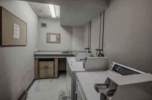 104-1720 13 Street Sw, Calgary, AB - Indoor Photo Showing Laundry Room