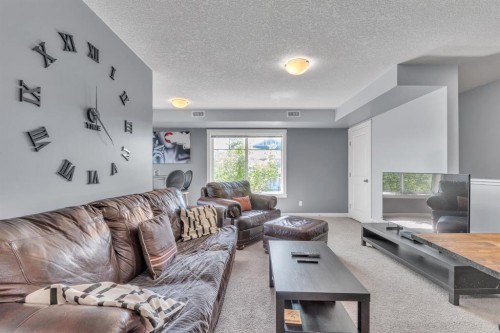 232-300 Marina Drive, Chestermere, AB - Indoor Photo Showing Living Room