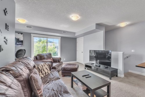 232-300 Marina Drive, Chestermere, AB - Indoor Photo Showing Living Room