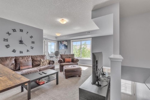 232-300 Marina Drive, Chestermere, AB - Indoor Photo Showing Living Room
