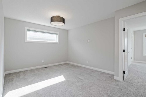28 Willow Street, Cochrane, AB - Indoor Photo Showing Other Room