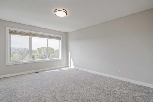 28 Willow Street, Cochrane, AB - Indoor Photo Showing Other Room