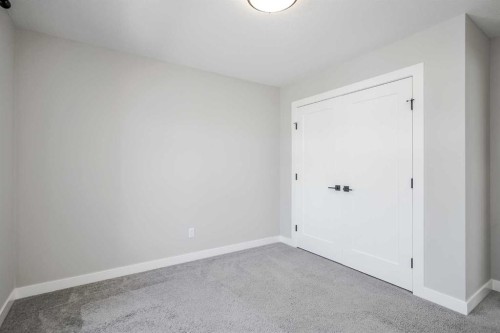 28 Willow Street, Cochrane, AB - Indoor Photo Showing Other Room