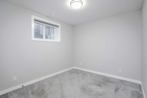 28 Willow Street, Cochrane, AB - Indoor Photo Showing Other Room