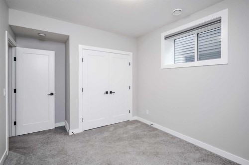 28 Willow Street, Cochrane, AB - Indoor Photo Showing Other Room