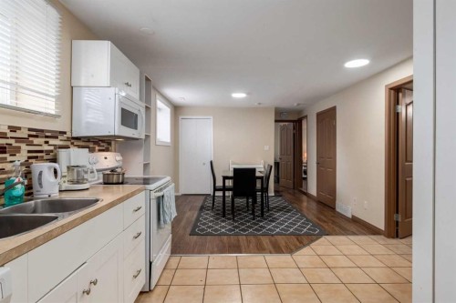1321 39 Street Se, Calgary, AB - Indoor Photo Showing Kitchen With Double Sink