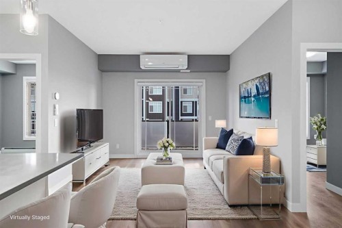 308-100 Auburn Meadows Manor Se, Calgary, AB - Indoor Photo Showing Living Room
