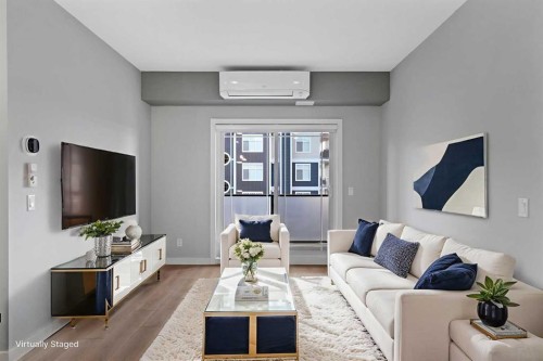 308-100 Auburn Meadows Manor Se, Calgary, AB - Indoor Photo Showing Living Room