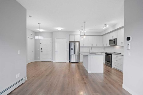 308-100 Auburn Meadows Manor Se, Calgary, AB - Indoor Photo Showing Kitchen With Stainless Steel Kitchen