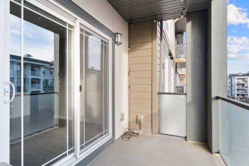 308-100 Auburn Meadows Manor Se, Calgary, AB - Outdoor With Balcony With Exterior