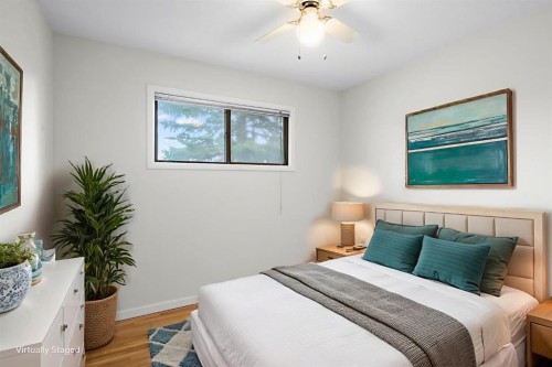 10631 Elbow Drive Sw, Calgary, AB - Indoor Photo Showing Bedroom