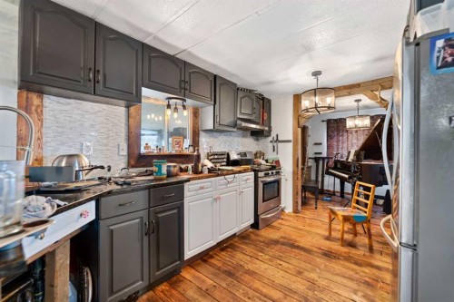 270065 Township Road 235, Rural Rocky View County, AB - Indoor Photo Showing Kitchen With Upgraded Kitchen