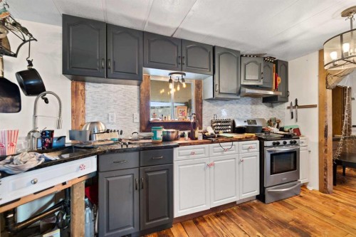270065 Township Road 235, Rural Rocky View County, AB - Indoor Photo Showing Kitchen With Upgraded Kitchen