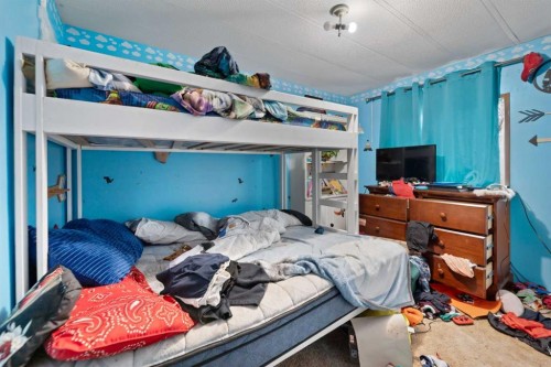 270065 Township Road 235, Rural Rocky View County, AB - Indoor Photo Showing Bedroom