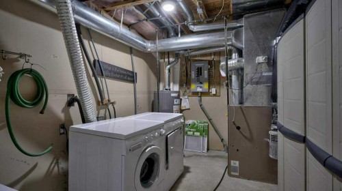 32 Mt Aberdeen Manor Se, Calgary, AB - Indoor Photo Showing Laundry Room