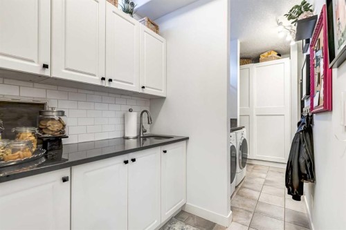 31 Tusslewood View Nw, Calgary, AB - Indoor Photo Showing Laundry Room