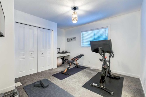 31 Tusslewood View Nw, Calgary, AB - Indoor Photo Showing Gym Room