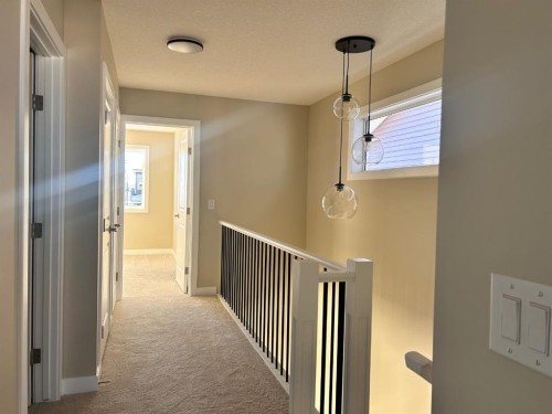 130 Sora Gardens Se, Calgary, AB - Indoor Photo Showing Other Room