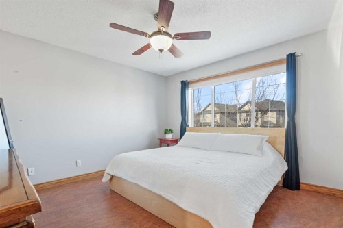 303 Drake Landing Close, Okotoks, AB - Indoor Photo Showing Bedroom